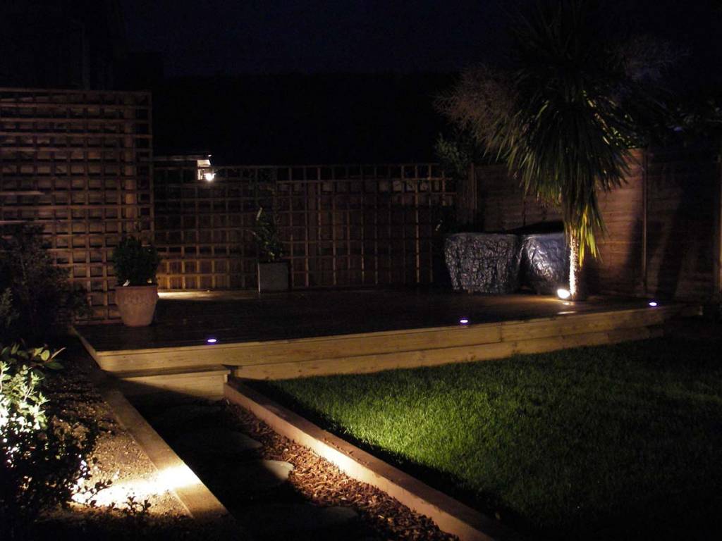 GP-landscape-shed-deck-raised-beds-with-lights-during-night.jpg